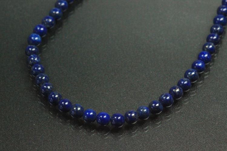 Lapis Lazuli spherical gemstone strand blue, approx. dimensions Ø 4mm, approx. 39,5cm long. Quality feature “A”. This gemstone strand was provisionally strung on blue pearl silk for further processing.