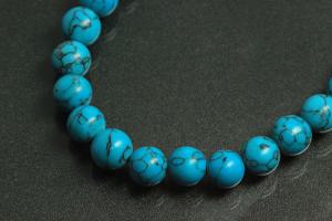 Turquoise reconstructed spherical gemstone strand, approx. dimensions Ø 8mm, approx. 39,0 - 40,0cm long.