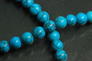 Turquoise reconstructed spherical gemstone strand, approx. dimensions Ø 8mm, approx. 39,0 - 40,0cm long.