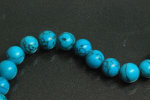 Turquoise reconstructed spherical gemstone strand, approx. dimensions Ø 8mm, approx. 39,0 - 40,0cm long.