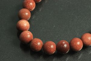 Gold sand stone spherical gemstone strand, approx. dimensions Ø 8mm, approx. 39,0 - 40,0cm long.