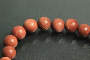 Gold sand stone spherical gemstone strand, approx. dimensions Ø 8mm, approx. 39,0 - 40,0cm long.