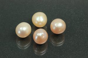 Freshwater pearl lot, undrilled, approx. dimensions 6,0mm to approx. 7.5mm, oval shape, color shades of peach.